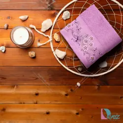 حوله دستی گلدوزی طرح گل برجسته رنگ یاسی - deniztowel