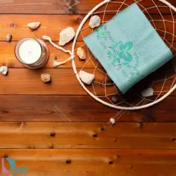 حوله دستی گلدوزی طرح پروانه رنگ فیروزه ای - deniztowel