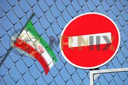 عکس استوک پرچم ایران پشت نرده با تابلو ممنوع است