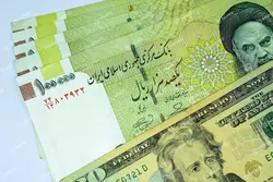 عکس استوک اسکناس ده هزار تومان و اسکناس دلار
