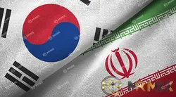 عکس استوک دو پرچم ایران و کره جنوبی با هم بافت پارچه