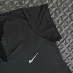 تیشرت ورزشی زنانه یقه دلبری نایک - ورزشاپ