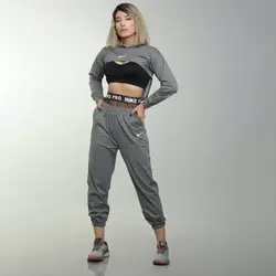 ست کراپ آستین دار جلو هلالی و شلوار بالا تور نایک - ورزشاپ