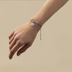 دستبند بند مشکی و پلاک