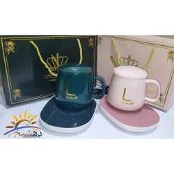 ماگ حرارتی سرامیکی در دار هیتر دار با صفحه گرم کننده برقی مدل 1314 رنگ سبز و صورتی و سفید و قرمز Lucky - دهشیخ سنتر