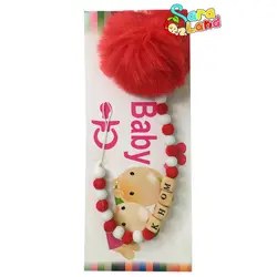 بند پستانک مهره ای چوبی QQ پوم دار رنگی - سیسمونی سارالند