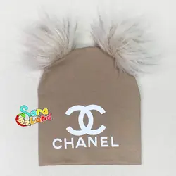 کلاه نوزاد پوم پوم رنگی طرح Chanel - سیسمونی سارالند