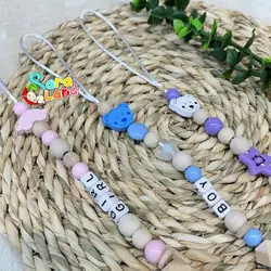 بند پستانک چوبی طرح گل رنگی