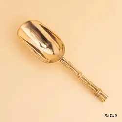 قاشق آجیل خوری برنجی طلایی مدل آمبوس طرح سرتاس درختی