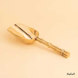 قاشق آجیل خوری برنجی طلایی مدل آمبوس طرح سرتاس درختی