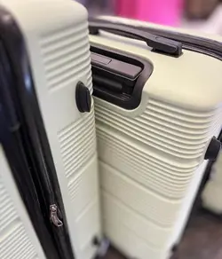 خرید چمدان دسینی متوسط از جنس پلی کربنات نشکن - چمدانکده