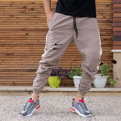 اسلش مردانه نواردار نایک نسکافه ای