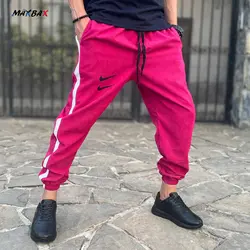 اسلش مردانه نواردار نایک سرخابی