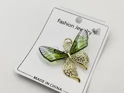 خرید سنجاق سینه طرح پروانه با کریستال شفاف • گالری بدلیجات ترنج