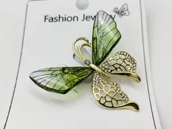 خرید سنجاق سینه طرح پروانه با کریستال شفاف • گالری بدلیجات ترنج