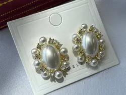 گوشواره مرواریدی و نگین کاری مجلسی &bull; گالری بدلیجات ترنج