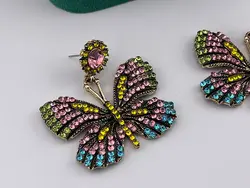 گوشواره پروانه ای با نگین کاری رنگی &bull; گالری بدلیجات ترنج