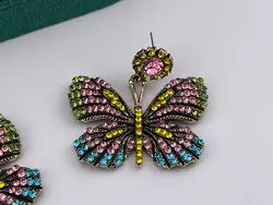 گوشواره پروانه ای با نگین کاری رنگی &bull; گالری بدلیجات ترنج