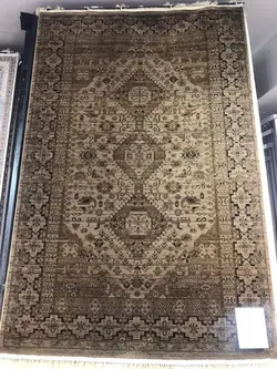 فرش رادین اصفهان طرح بلوچ 4 رنگ زمینه خاکی