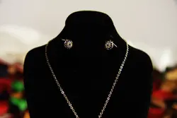 نیم ست طرح جواهر چشم نظر نگین کاری (برند zj)