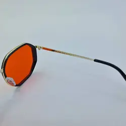 خرید عینک شب برند Police با فریم طلایی 8 ضلعی و عدسی قرمز مدل 8387 | فروشگاه آرکوشاپ