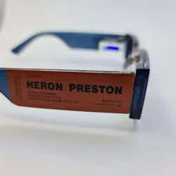 خرید عینک آفتابی تراز دار با دسته پهن و دو رنگ آبی و زرد HERON PRESTON مدل 21090 | فروشگاه آرکوشاپ