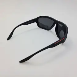 خرید عینک آفتابی ورزشی پلاریزه پرادا با فریم مشکی مات و عدسی تیره مدل 2098 | فروشگاه آرکوشاپ
