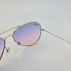 خرید عینک شب خلبانی با لنز دو رنگ بنفش و صورتی برند ریبن و فریم طلایی مدل 3026 | فروشگاه آرکوشاپ