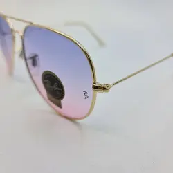 خرید عینک شب خلبانی با لنز دو رنگ بنفش و صورتی برند ریبن و فریم طلایی مدل 3026 | فروشگاه آرکوشاپ