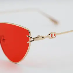 خرید عینک شب فانتزی با فریم مثلثی طلایی رنگ و عدسی قرمز برند دیتیای مدل 7641 | فروشگاه آرکوشاپ