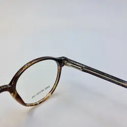 خرید عینک طبی کائوچو با فریم گرد و رنگ قهوه ای و دسته فنری مدل 2980 | فروشگاه آرکوشاپ