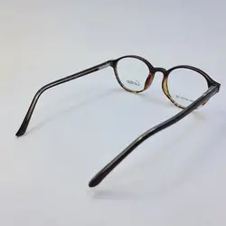 خرید عینک طبی کائوچو با فریم گرد و رنگ قهوه ای و دسته فنری مدل 2980 | فروشگاه آرکوشاپ