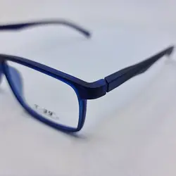 خرید عینک طبی مستطیلی شکل آبی رنگ با فریم TR90 و دسته فنری مدل 9831 | فروشگاه آرکوشاپ