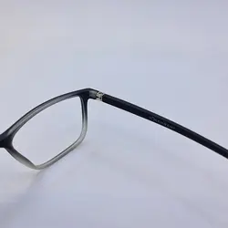 خرید عینک طبی مستطیلی شکل با فریم مشکی و تی آر 90 و دسته فنری مدل 2003 | فروشگاه آرکوشاپ
