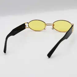 خرید عینک شب جنتل مانستر با فریم طلایی، بیضی شکل و دسته مشکی و لنز زرد مدل B2069 | فروشگاه آرکوشاپ