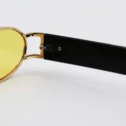 خرید عینک شب جنتل مانستر با فریم طلایی، بیضی شکل و دسته مشکی و لنز زرد مدل B2069 | فروشگاه آرکوشاپ