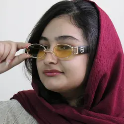 خرید عینک شب جنتل مانستر با فریم طلایی، بیضی شکل و دسته مشکی و لنز زرد مدل B2069 | فروشگاه آرکوشاپ