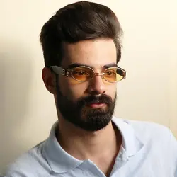 خرید عینک شب جنتل مانستر با فریم طلایی، بیضی شکل و دسته مشکی و لنز زرد مدل B2069 | فروشگاه آرکوشاپ