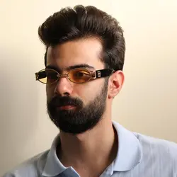 خرید عینک شب جنتل مانستر با فریم طلایی، بیضی شکل و دسته مشکی و لنز زرد مدل B2069 | فروشگاه آرکوشاپ