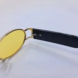 خرید عینک شب جنتل مانستر با فریم طلایی، بیضی شکل و دسته مشکی و لنز زرد مدل B2069 | فروشگاه آرکوشاپ