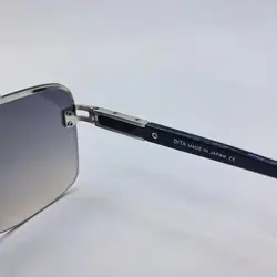 خرید عینک آفتابی مردانه دیتا نیم فریم با رنگ نقره ای و لنز آنتی رفلکس مدل 09K | فروشگاه آرکوشاپ