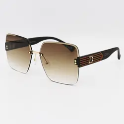 خرید عینک آفتابی زنانه بدون فریم با دسته قهوه‌ای و لنز سایه روشن DIOR مدل D2328 | فروشگاه آرکوشاپ