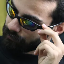 خرید عینک آفتابی اوکلی با فریم نقره ای رنگ، لنز آینه ای و آبی رنگ مدل W2236 | فروشگاه آرکوشاپ