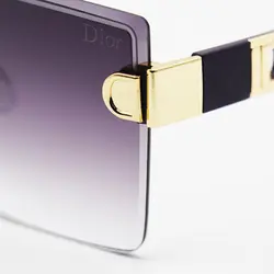 خرید عینک آفتابی زنانه با دسته بنفش رنگ، فریم لس، مربعی شکل و لنز دودی سایه روشن DIOR مدل 2242 | فروشگاه آرکوشاپ