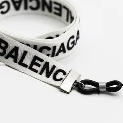 خرید بند عینک نواری بالنسیاگا با رنگ سفید و از جنس پارچه‌ای مدل 992535 | فروشگاه آرکوشاپ