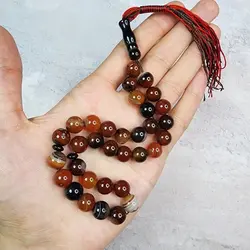 تسبیح سنگی عقیق سلیمانی مشکی و قرمز 33 مهره سایز 10 | تسبیح اصل | تسبیح اورجینال | تسبیح صلوات | تسبیح متبرک | تسبیح آنتیک و کلکسیونی و عتیقه | تسبیح طبیعی | تسبیح فاخر | هدیه روز پدر | تسبیح دست ساز