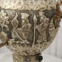 سماور گازی برنجی ۶ لیتری قلم دست برجسته هخامنش آنتیک کد ۱۳۰۲