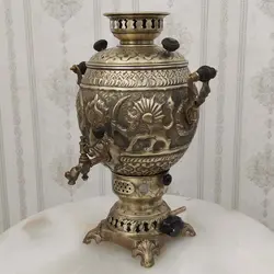 سماور گازی برنجی ۶ لیتری قلم دست برجسته شیر و خورشید آنتیک کد ۱۳۰۳