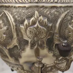 سماور گازی برنجی ۶ لیتری قلم دست برجسته شیر و خورشید آنتیک کد ۱۳۰۳