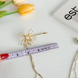 پک سنجاق گل منجوق کریستالی و گوشواره قلبی